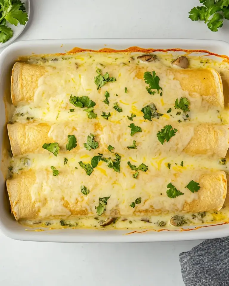 Homemade Creamy Chicken Spinach and Mushroom Enchiladas photo