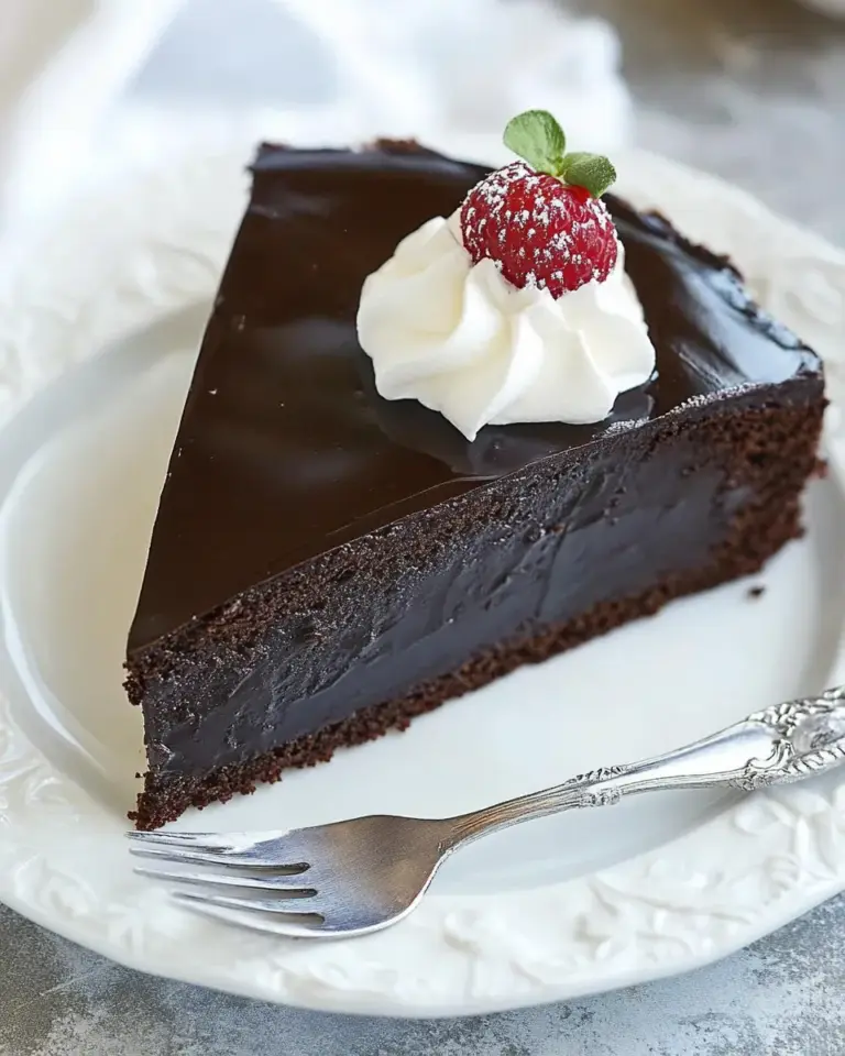 Homemade Flourless Chocolate Cake with Ganache Topping photo