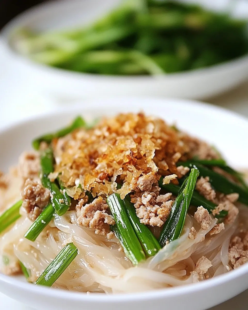 Delicious Thai Noodles with Ground Chicken and Crispy Shallots plate image